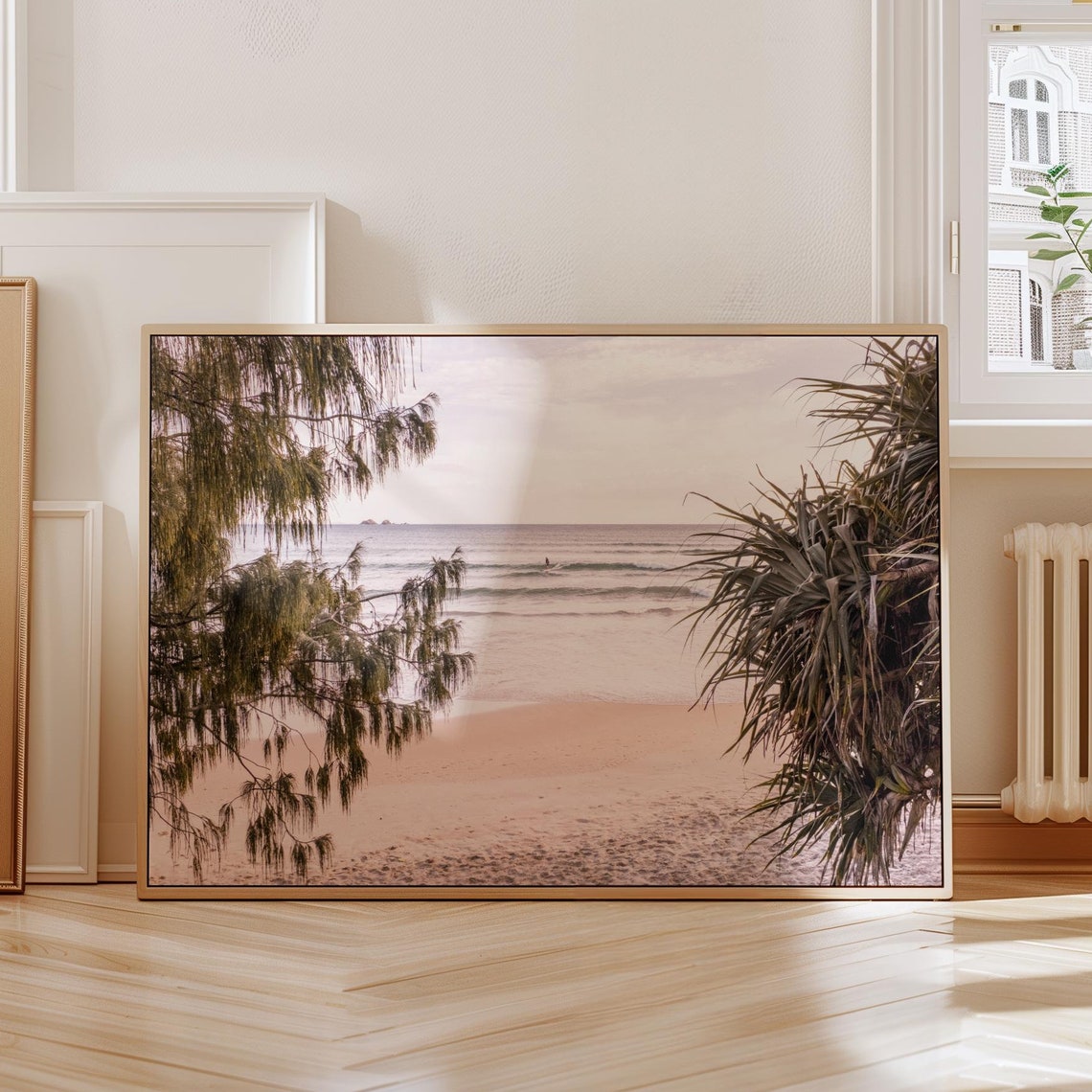 Byron Bay Beach Framed by Coastal Trees and Ocean Waves Poster