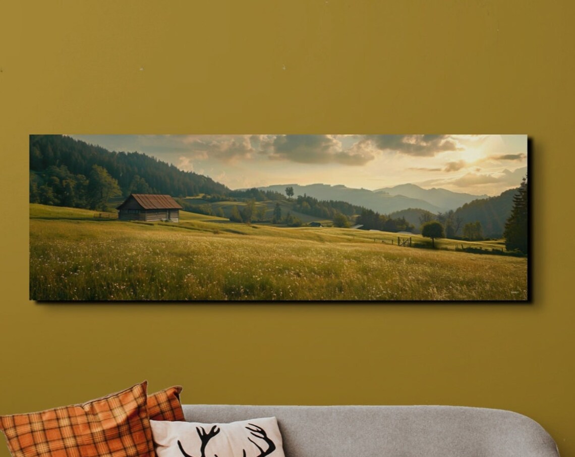 Golden Field with a Wooden Cabin Beneath Mountain Sunset Poster