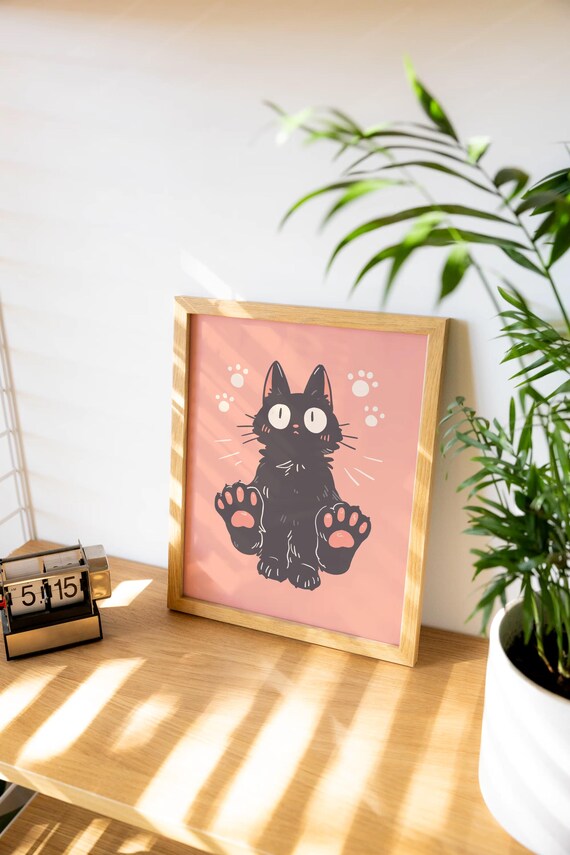 Playful Black Cat Showing Its Paws on Pink Background Poster