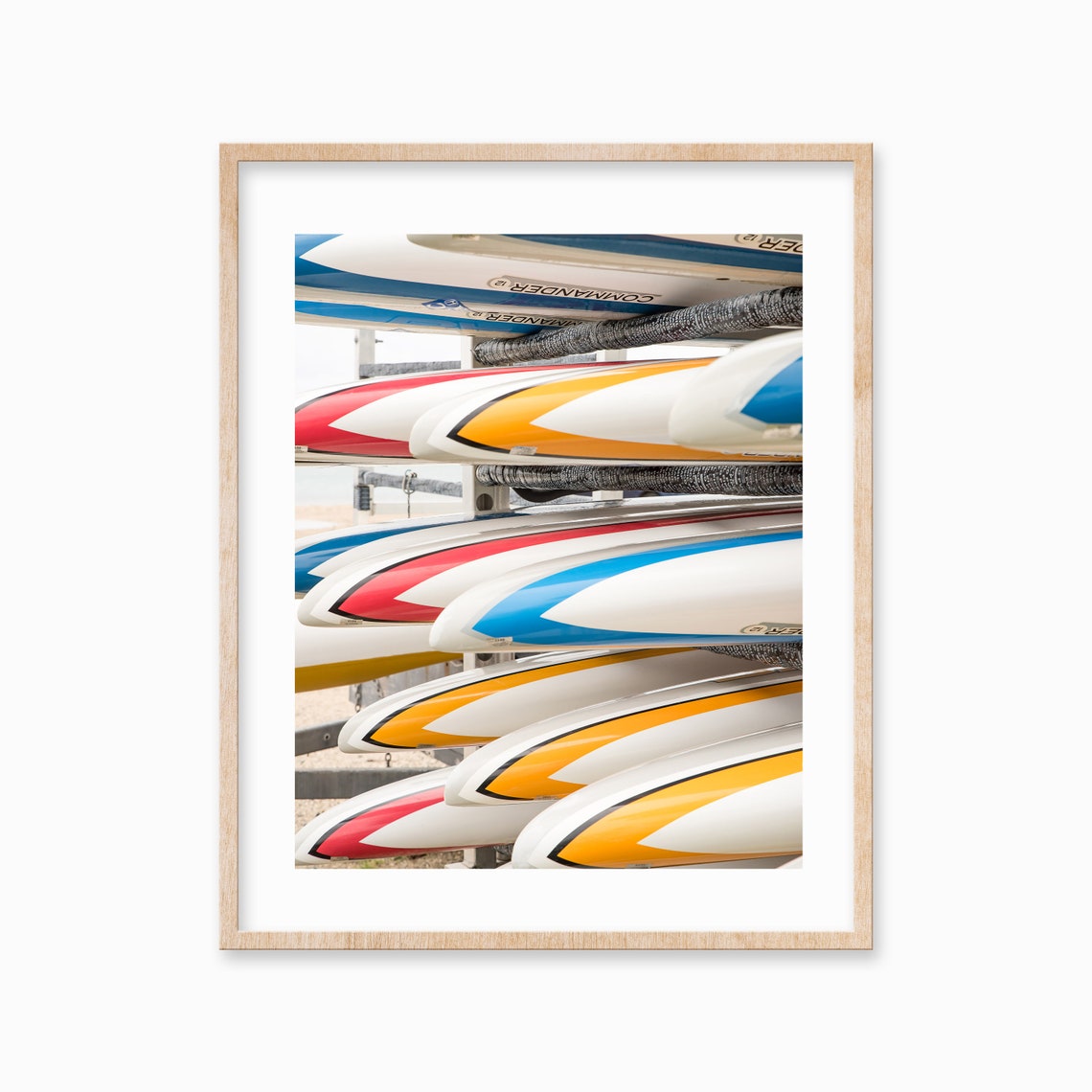 Colorful Paddle Race Boards Stacked on Rack Beach Lifestyle Poster