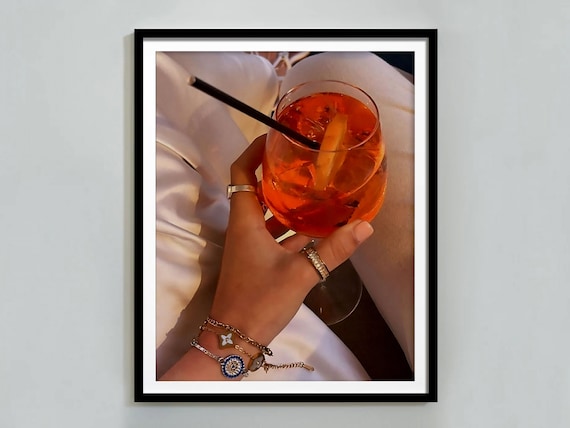 Aperol Spritz Cocktail in Hand Close Up Bar Cart Photo Poster