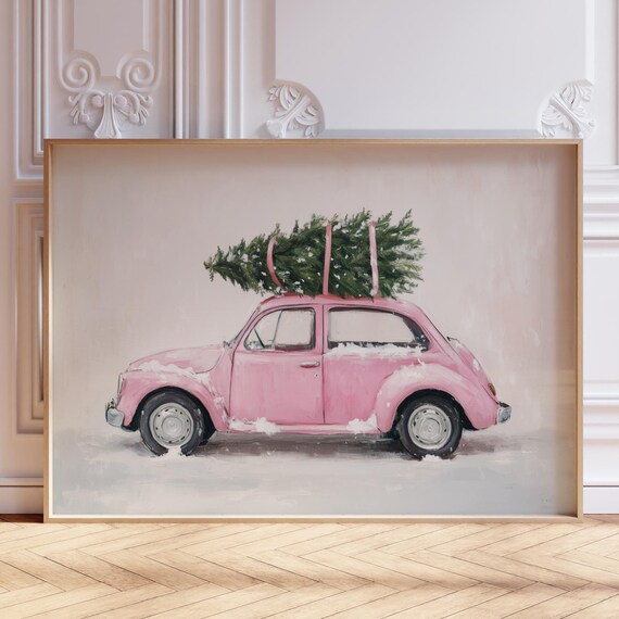 Pink Vintage VW Beetle Carrying a Christmas Tree in Snow Poster
