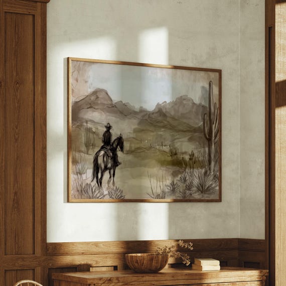 Cowboy On Horseback Overlooking Desert Canyon