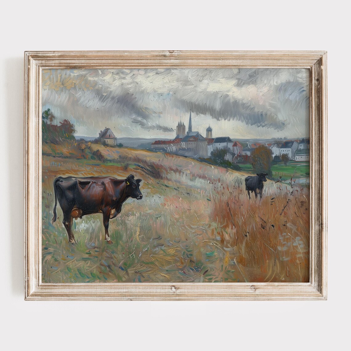 Cows Grazing in Golden Pasture with Distant Village Spires Poster