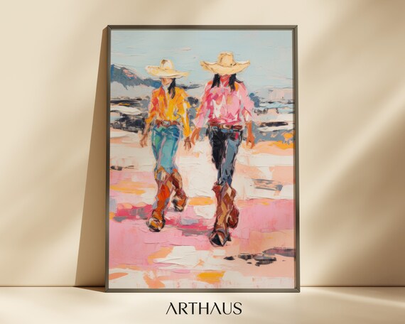 Two Cowgirls In Colorful Shirts Walking On A Pink Shore Poster