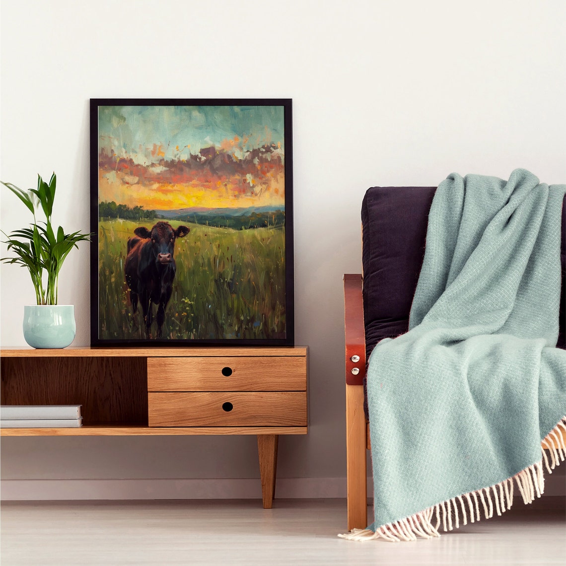 Black Cow in a Green Pasture Under a Beautiful Glowing Sunset Poster - Image 3