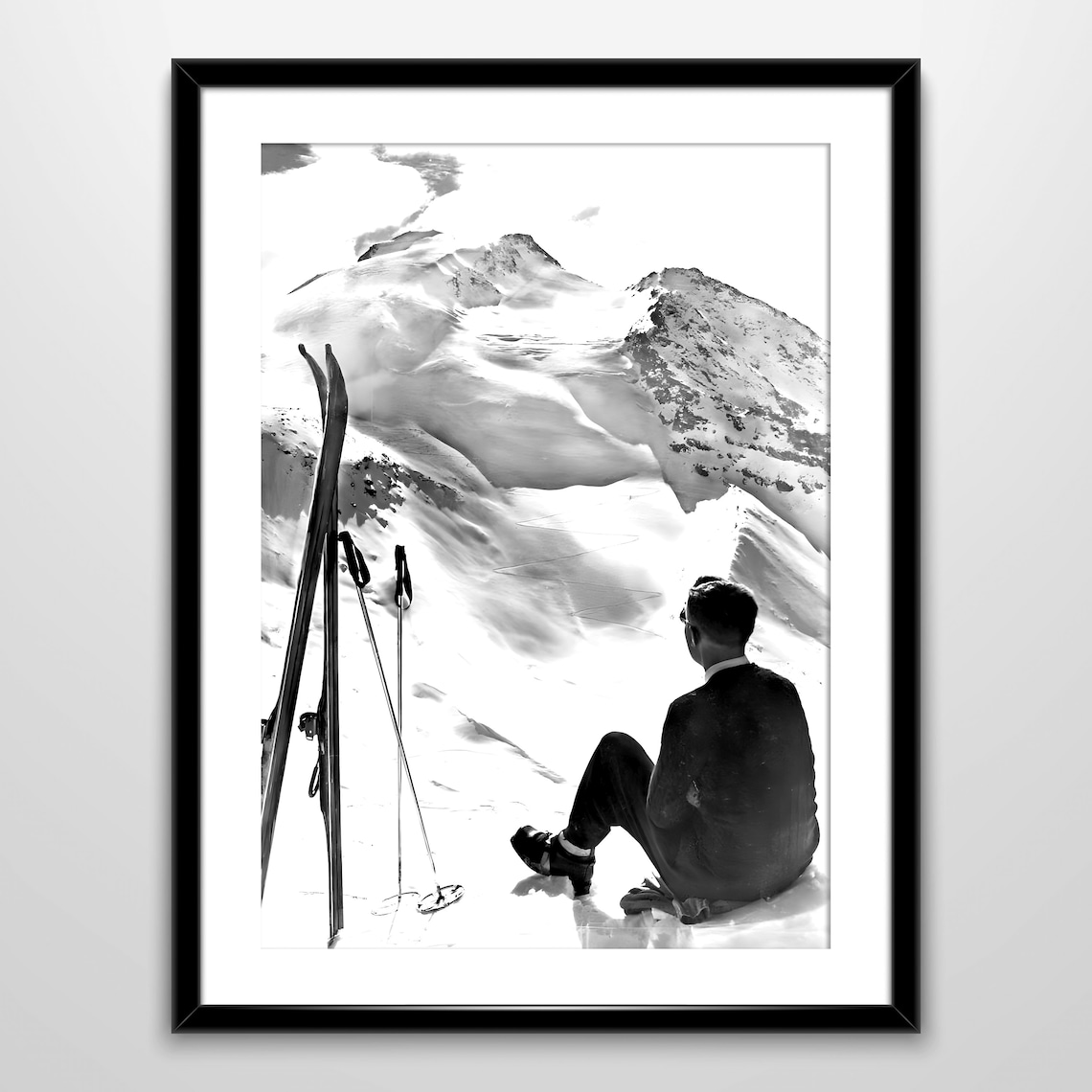 Man Sitting On Snowy Mountain Peak Gazing At Winter Summit Views Poster - Image 2