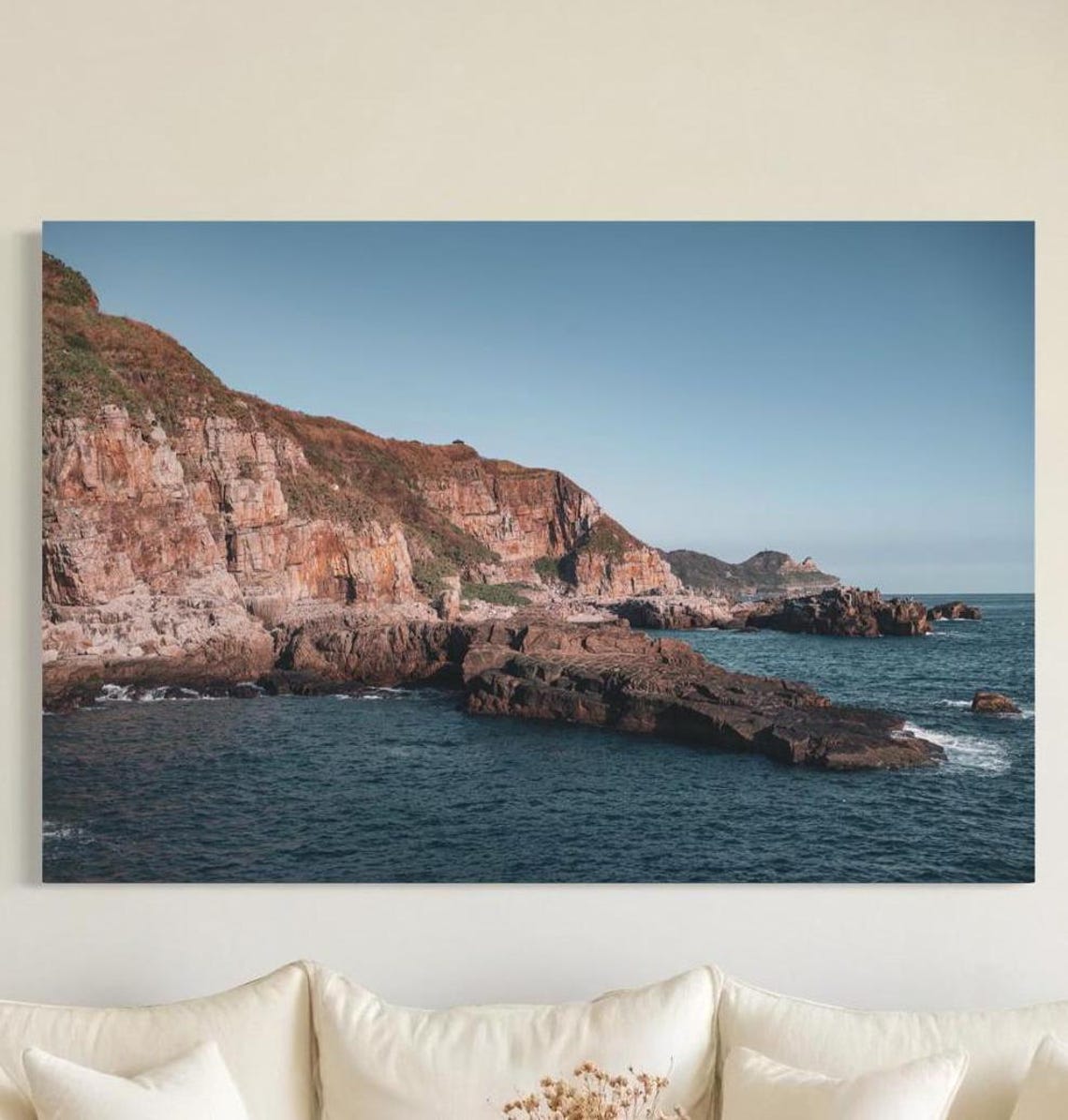 Rugged Sea Cliffs and Rock Formations Over the Blue Ocean Poster