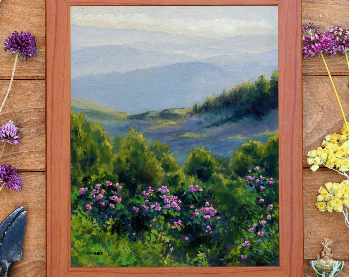 Mountain Valley with Pink Wildflowers under Misty Blue Peaks Poster - Image 3