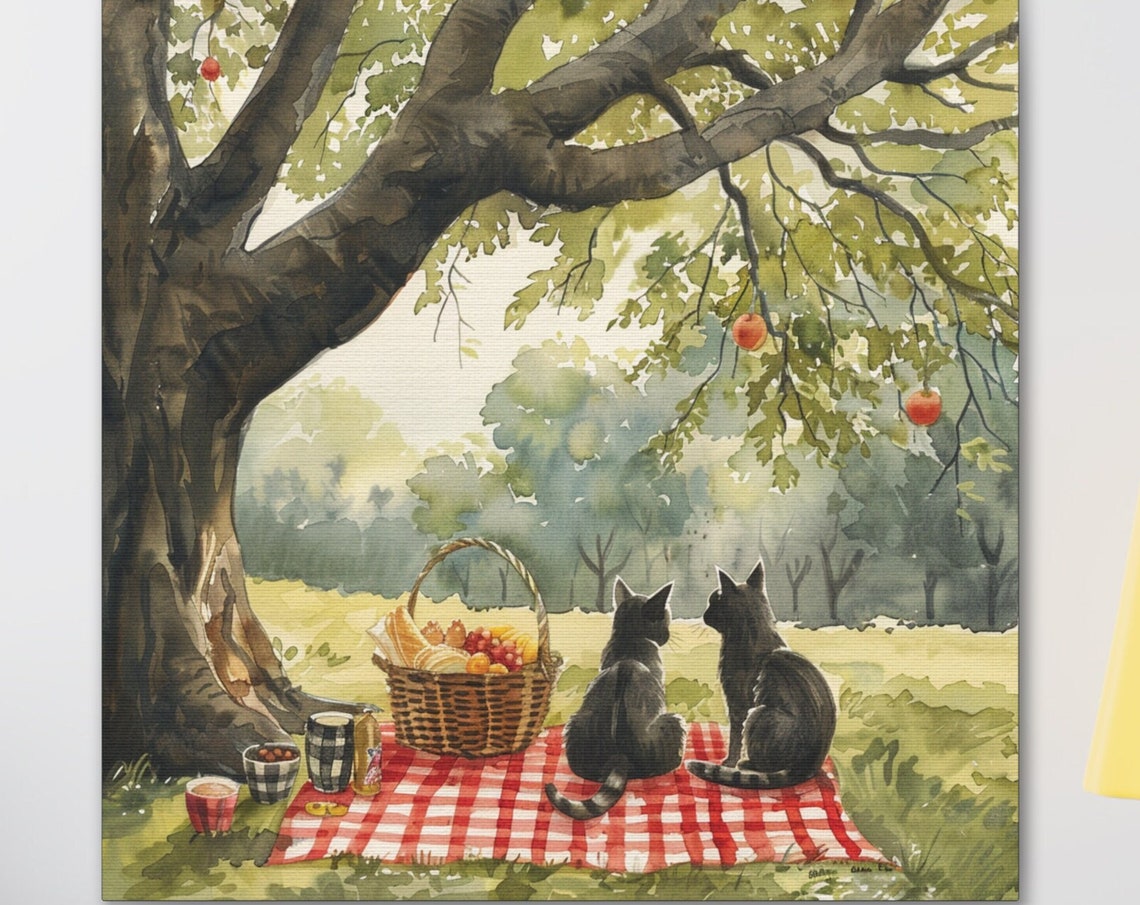 Two Black Cats Enjoying a Picnic Under a Grand Apple Tree Poster