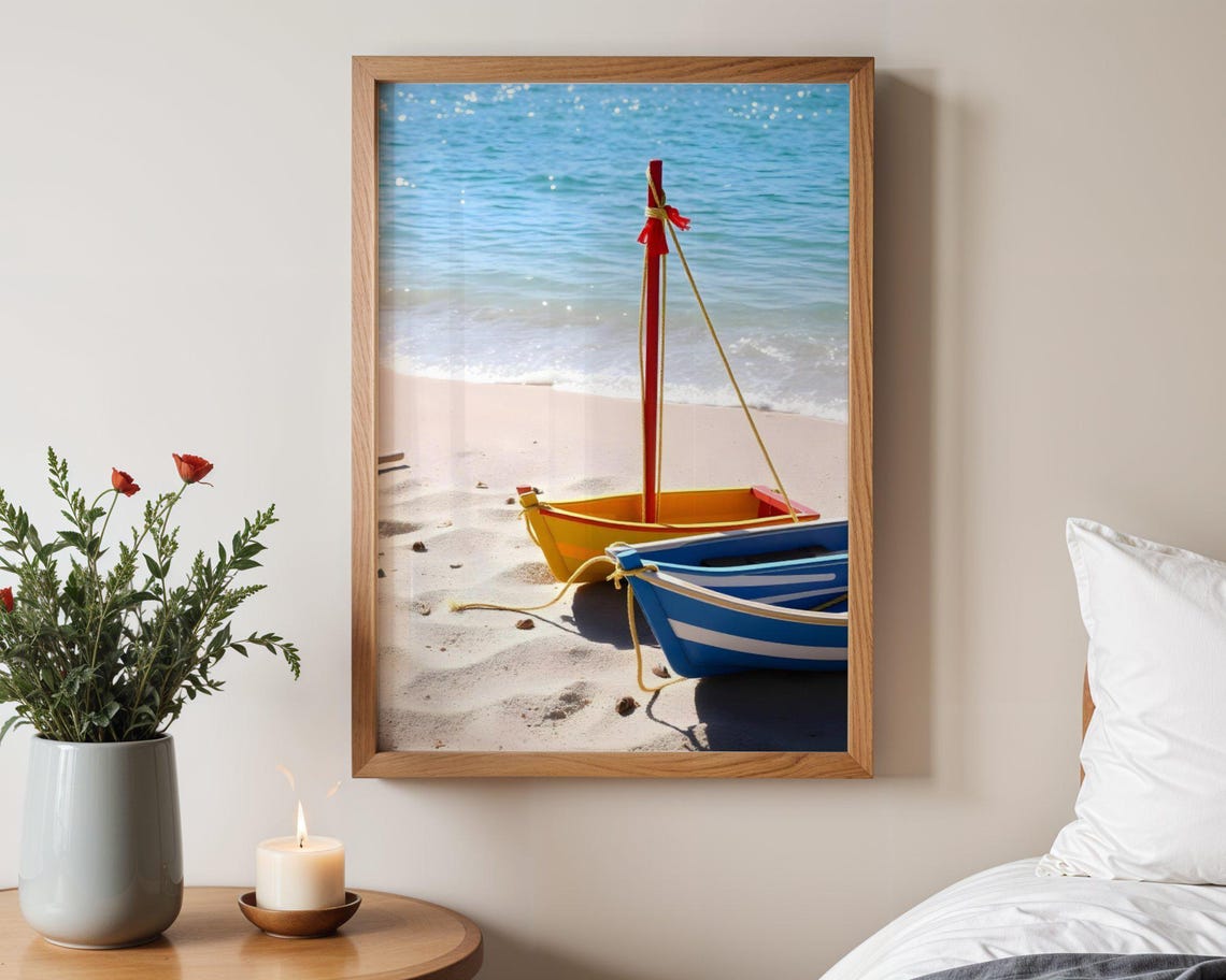 Two Colorful Wooden Boats Resting on Sunny Beach Shore Poster