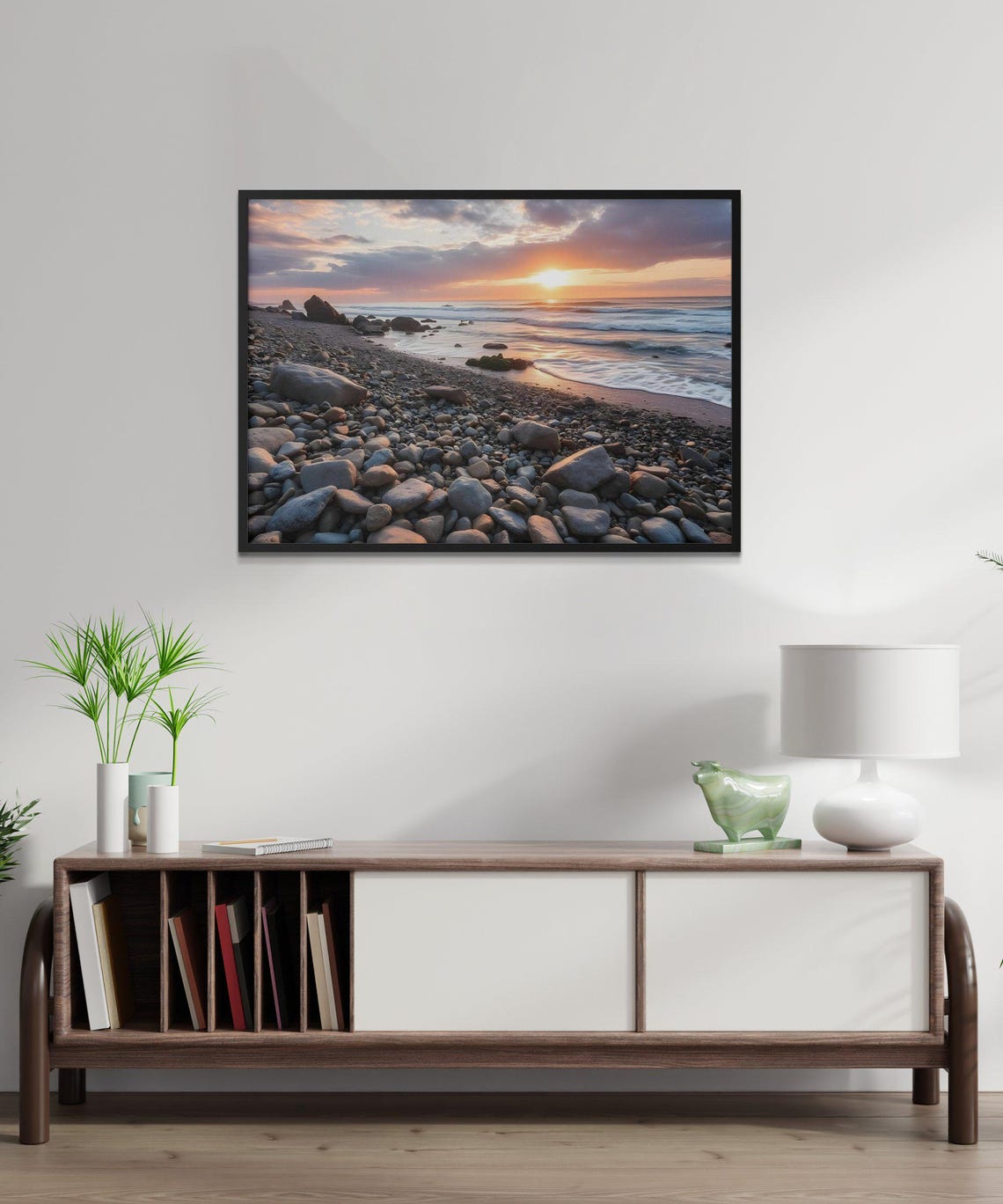 Sunset Over a Rocky Pebble Beach with Rolling Ocean Waves Poster - Image 3