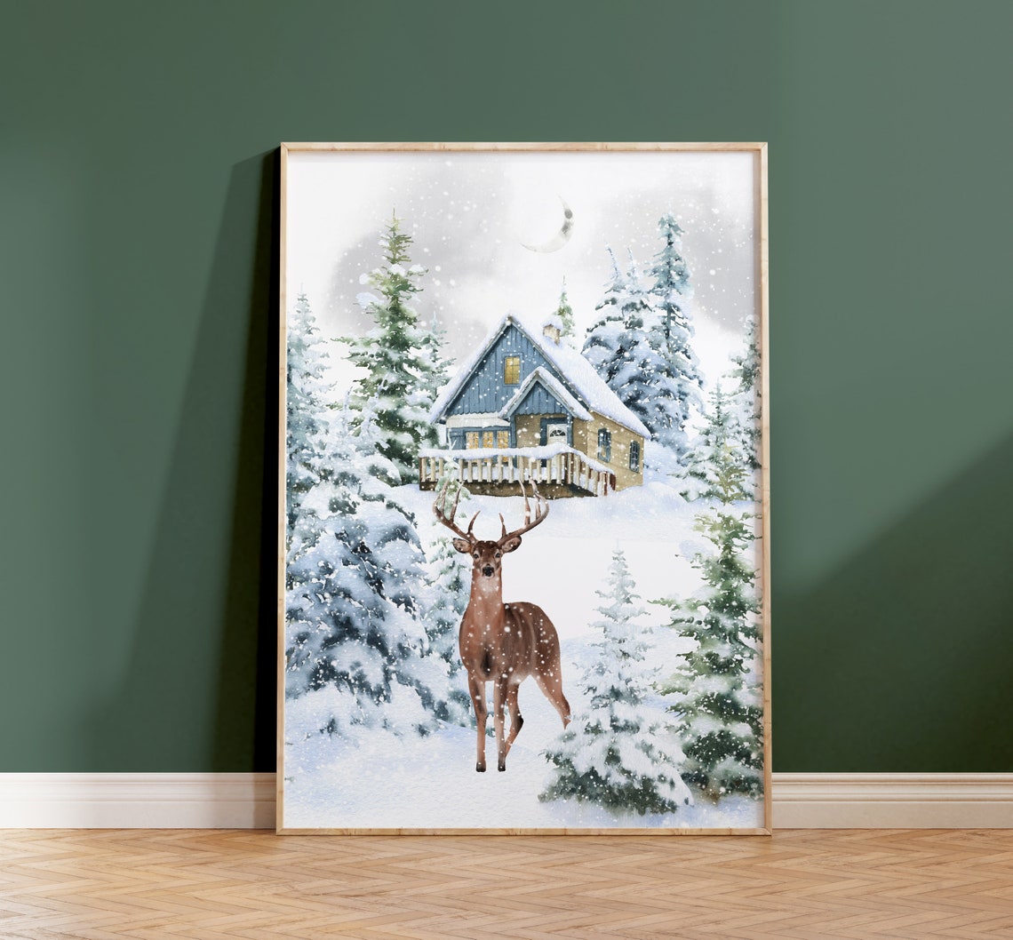 Majestic Buck Deer Before Snowy Cabin Under Crescent Moon Poster