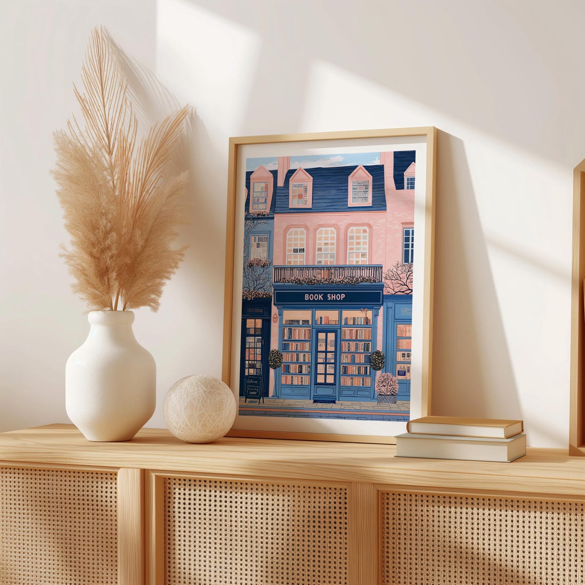 Navy Book Shop Storefront With Parisian Pink Building Above Poster - Image 3