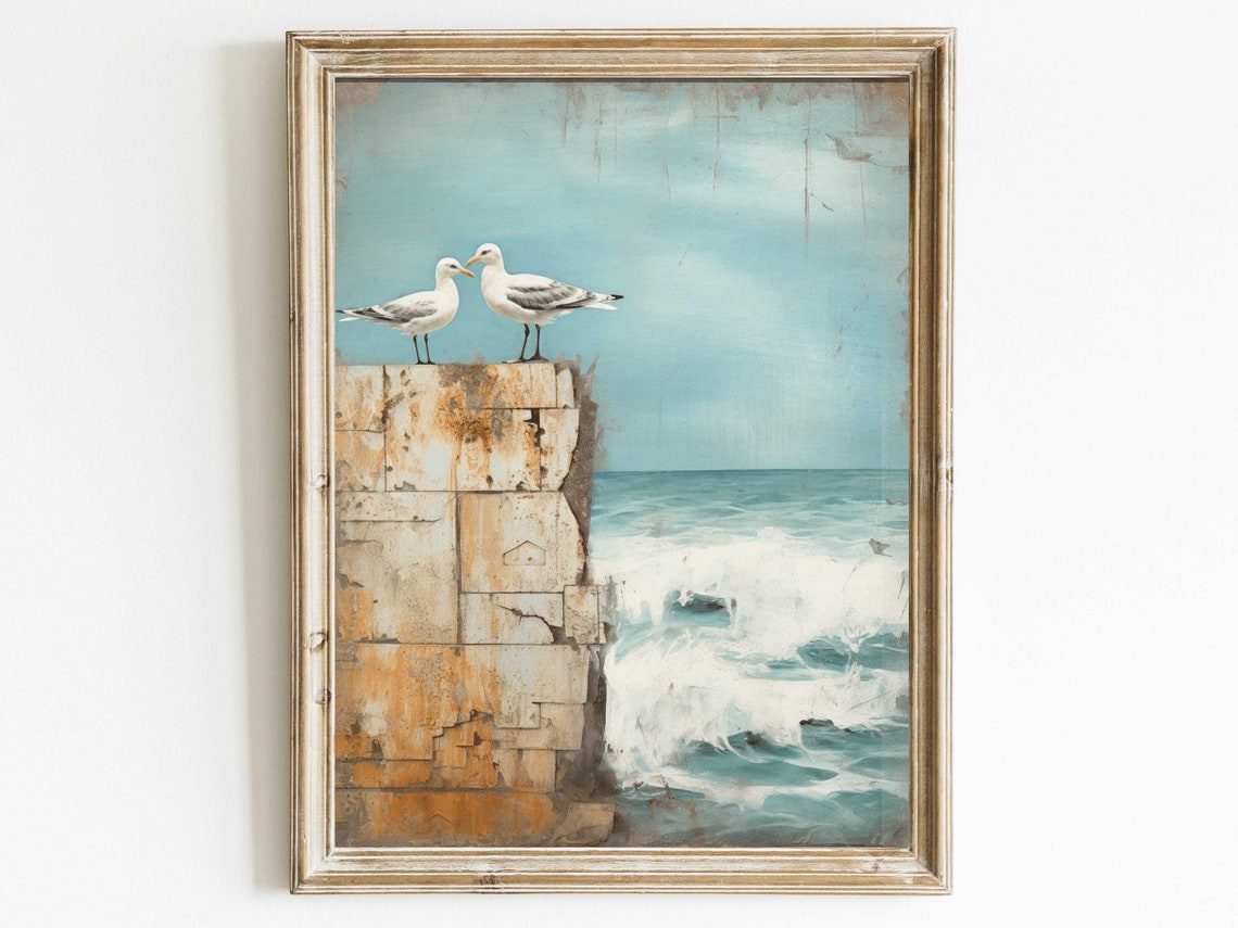 Two Seagulls Perched on a Weathered Pier Above Ocean Waves Poster