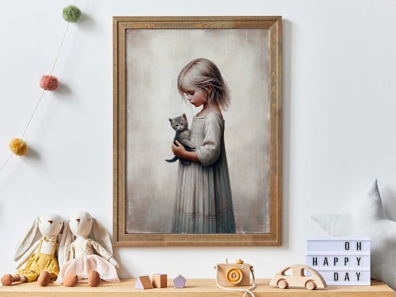 Gentle Young Girl Cradling a Gray Kitten in Soft Light Poster