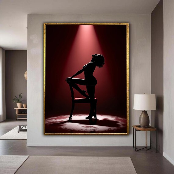 Silhouette Of Woman On Chair Under Dramatic Red Spotlight Poster