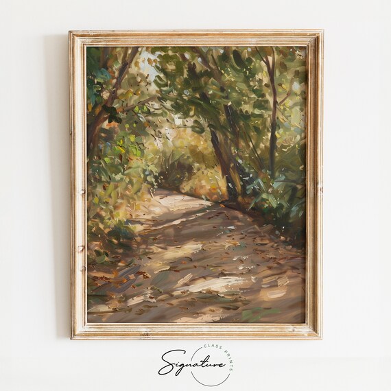 Sunlit Woodland Path with Dappled Light Through Green Trees Poster