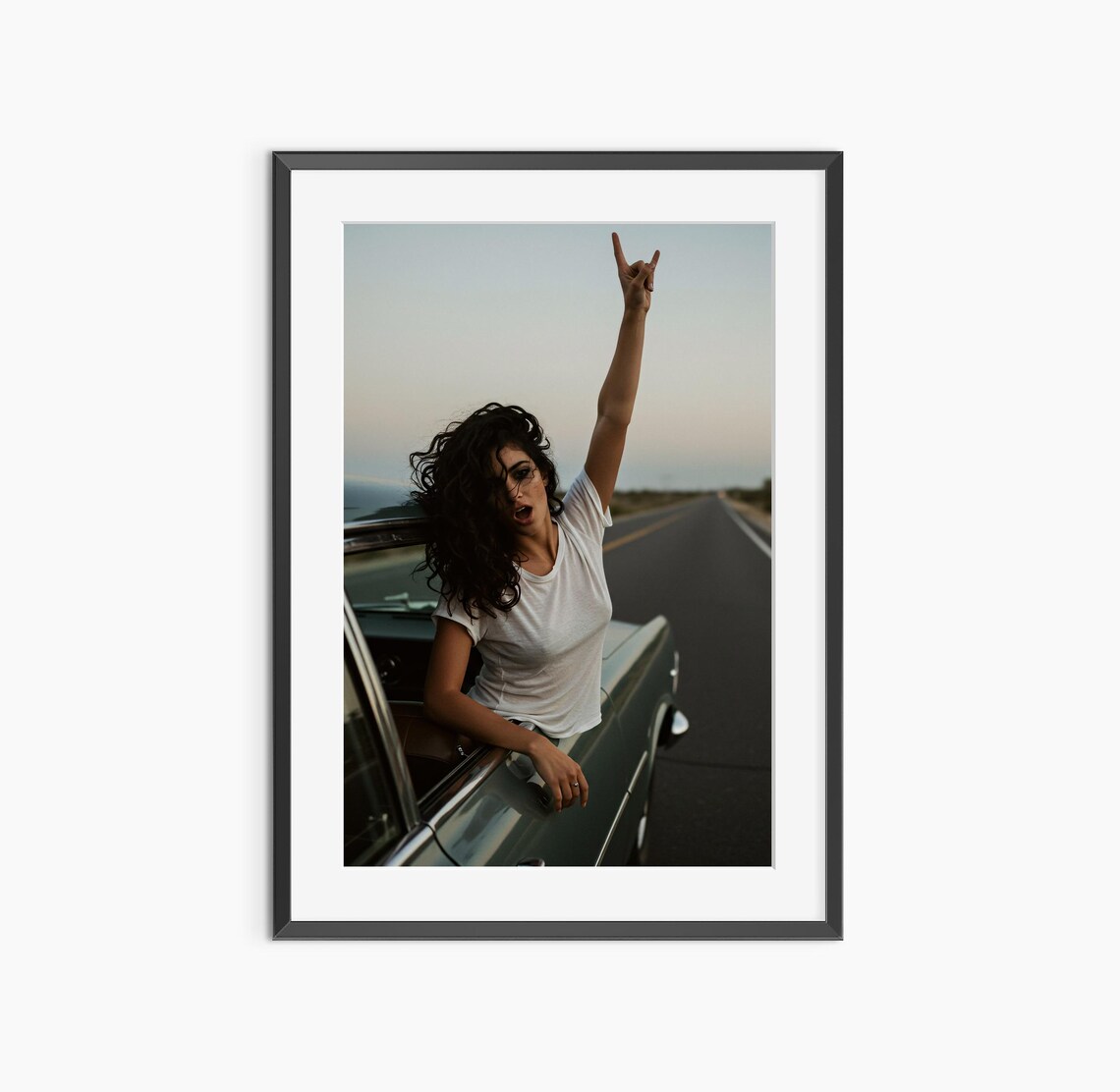 Rock On Hand Gesture Woman Leaning Out Car Window Dusk Road Trip Poster