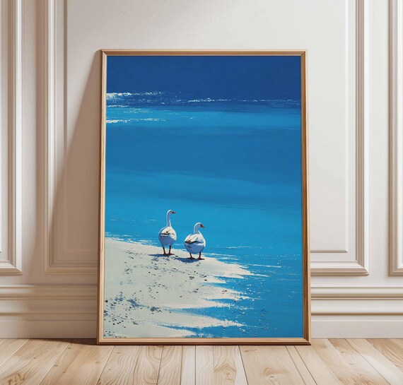 Two White Ducks Standing On A Tranquil Blue Beach Shoreline Poster