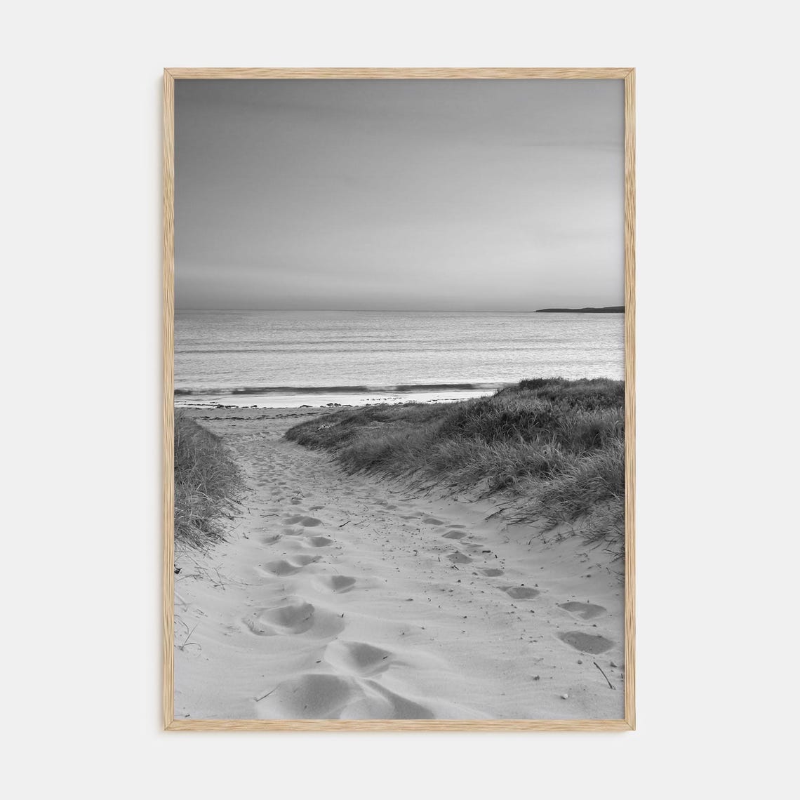 Sandy Trail with Footsteps Across Dune to Ocean Beach Poster