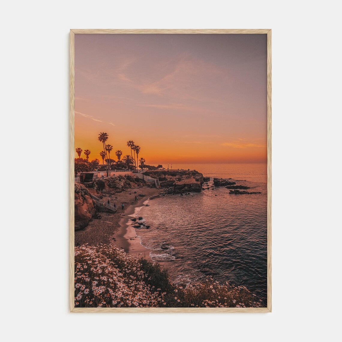 Burning Orange Sunset Over Rocky Cove with Palm Silhouettes Poster
