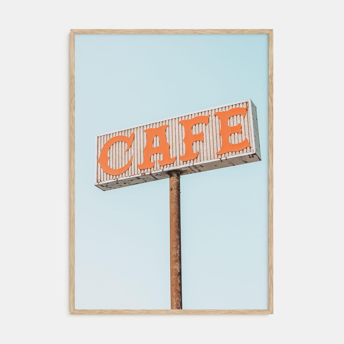 Vintage Orange CAFE Road Sign Against a Pale Blue Sky Poster