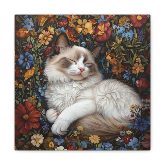 Fluffy Ragdoll Cat Sleeping in a Vibrant Wildflower Garden Poster