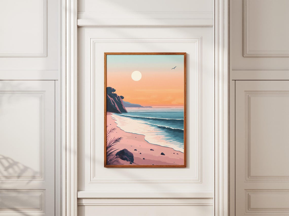Soft Pink Sunrise Over a Curved Beach with Rocky Cliffs Poster - Image 2