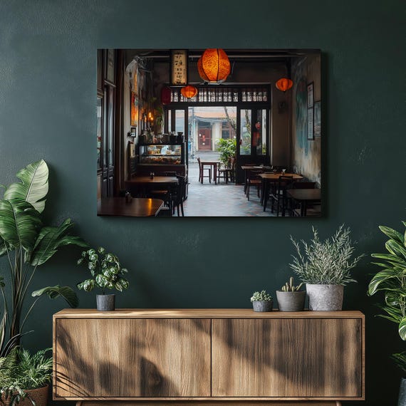 Vintage Cafe Interior Canvas Wall Art Warm Paper Lanterns Wooden Tables Pastry Display Case Coffee Shop Open Doorway Rustic Orange Tones