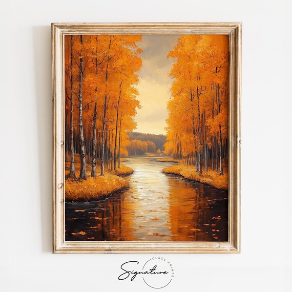 Golden Birch Trees Lining a Still River in Glowing Autumn Light Wall Art