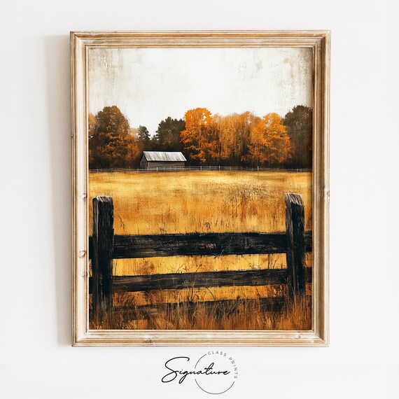 Rustic Old Barn Behind Dark Wooden Fence in Golden Field Poster