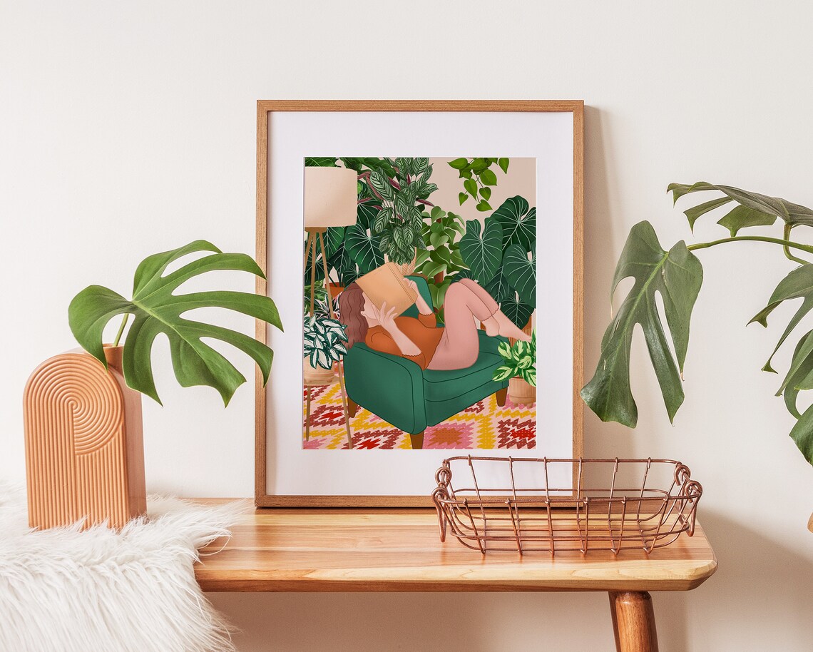 Woman Reading in a Green Armchair Surrounded by Tropical Plants Poster - Image 3