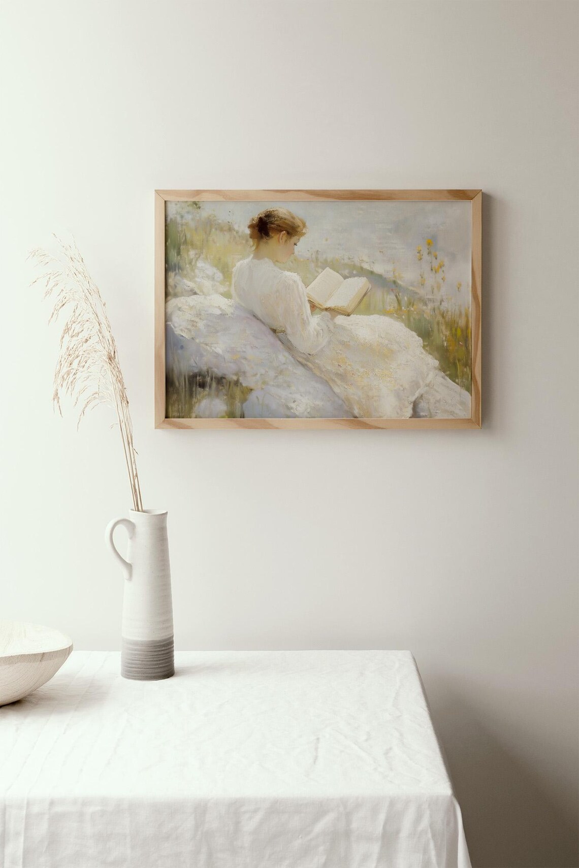Young Woman Reading a Book in a Sunny Wildflower Meadow Art Poster - Image 2