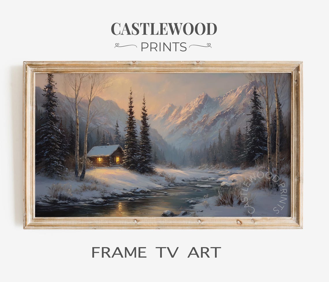Winter Cabin with Glowing Windows Beside a Snowy River Sunrise Poster