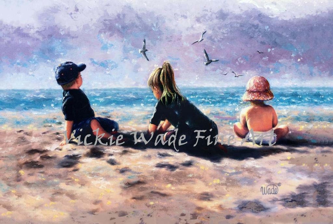 Three Children Playing in the Sand by the Sparkling Ocean Poster