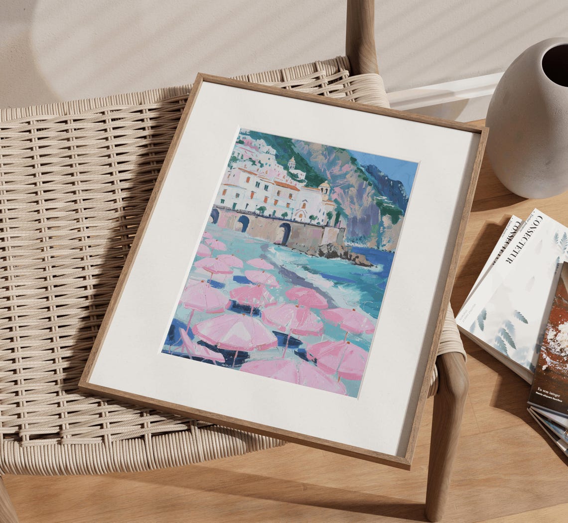 Sunlit Mediterranean Cliff Town With Pink Beach Umbrellas Poster