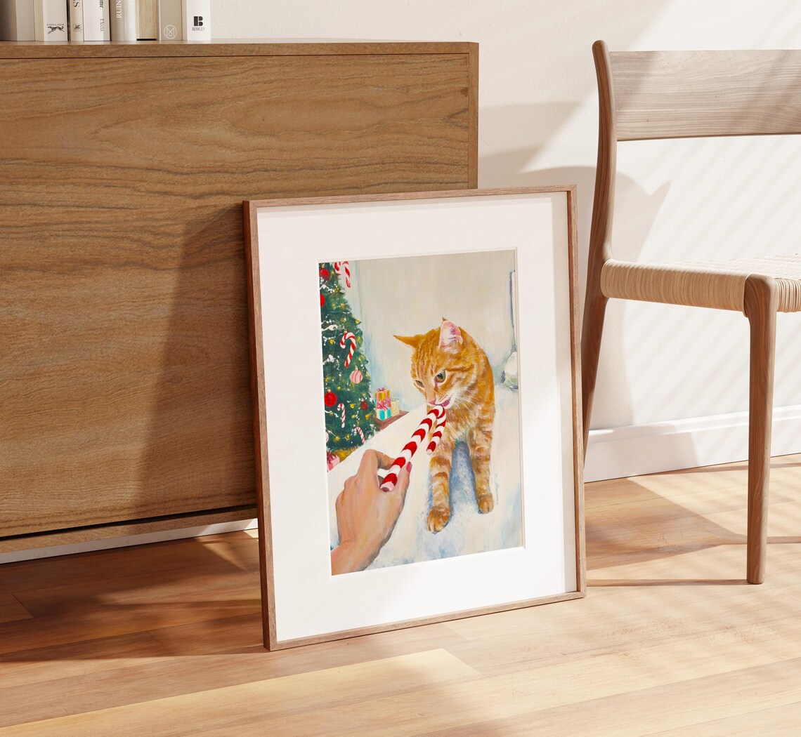 Ginger Tabby Cat Licking Candy Cane by the Christmas Tree Poster - Image 2