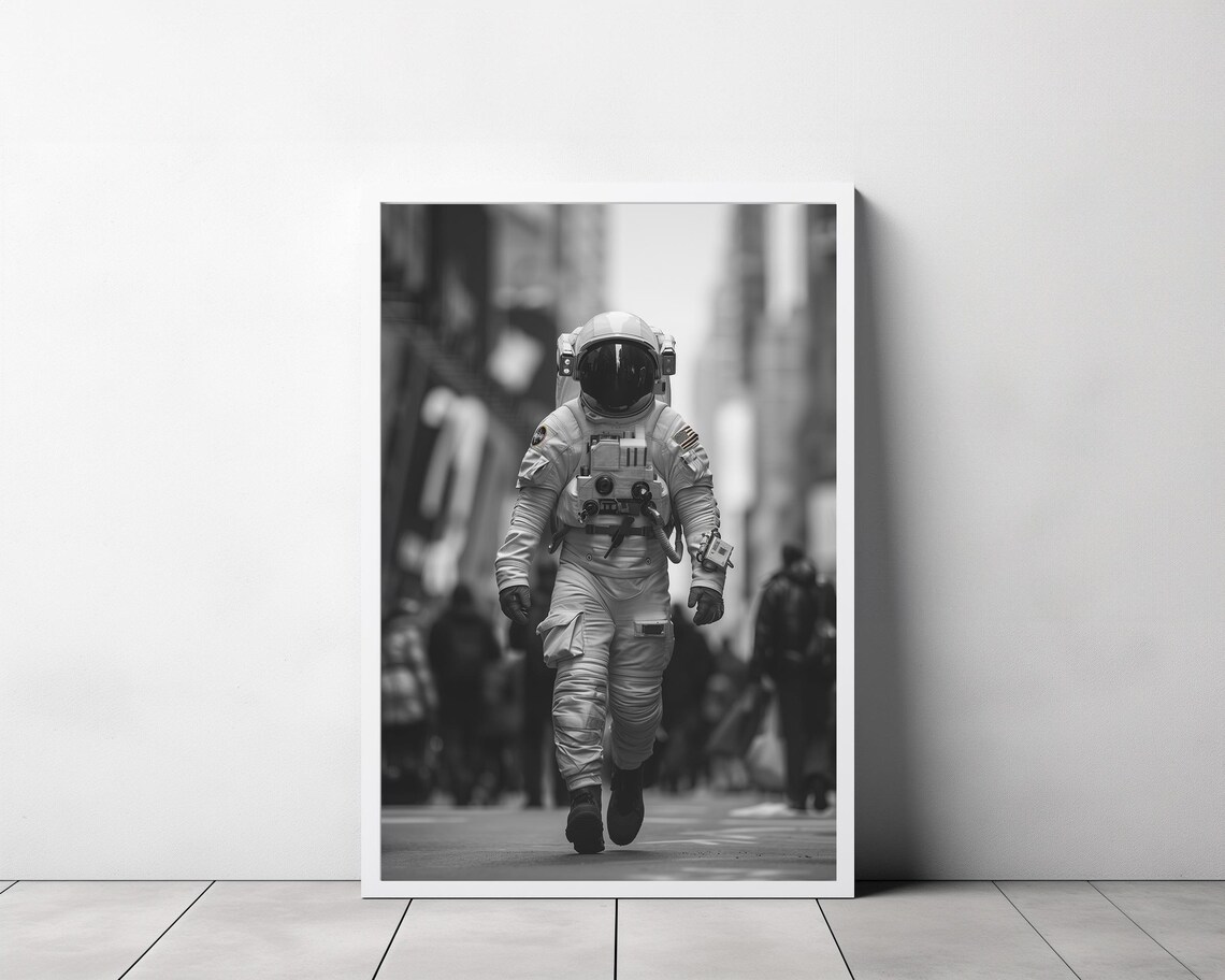 Astronaut Walking Down a Busy City Street Black and White Photo Poster - Image 3