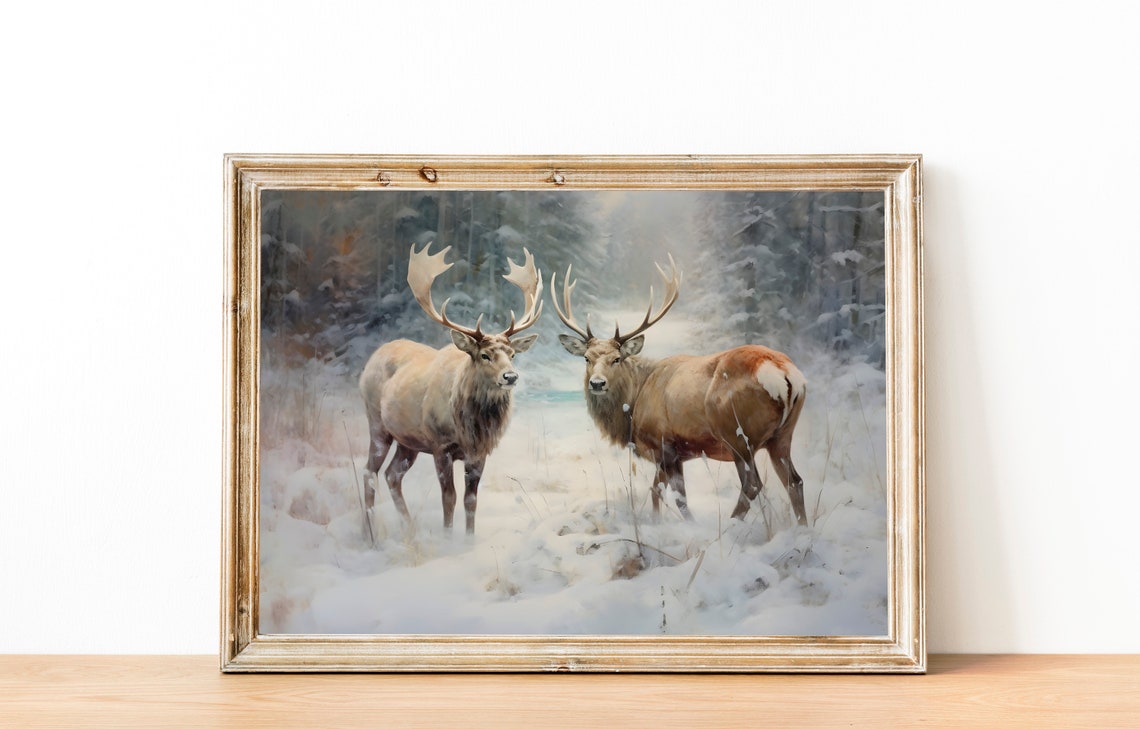 Two Majestic Stags Standing in Snow with Winter Forest Behind Poster - Image 3