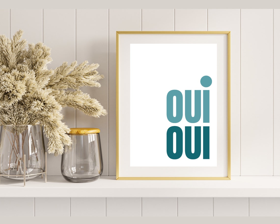 Oui Oui Typography Poster In Two Teal Shades On A White Wall - Image 3
