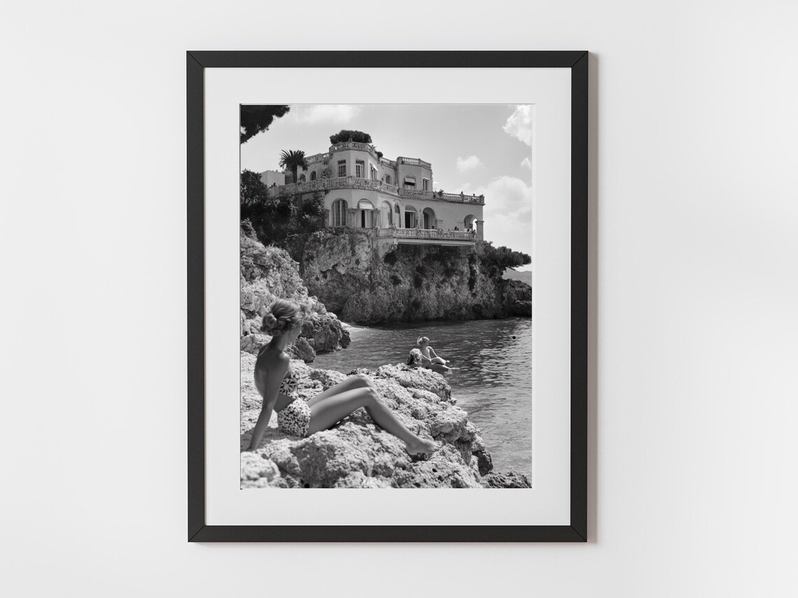 Vintage Black and White Woman Lounging on Coastal Rocks Photo Poster