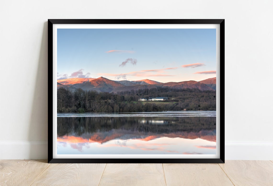Snow Dusted Mountains Reflected in a Still Lake at Sunrise Poster