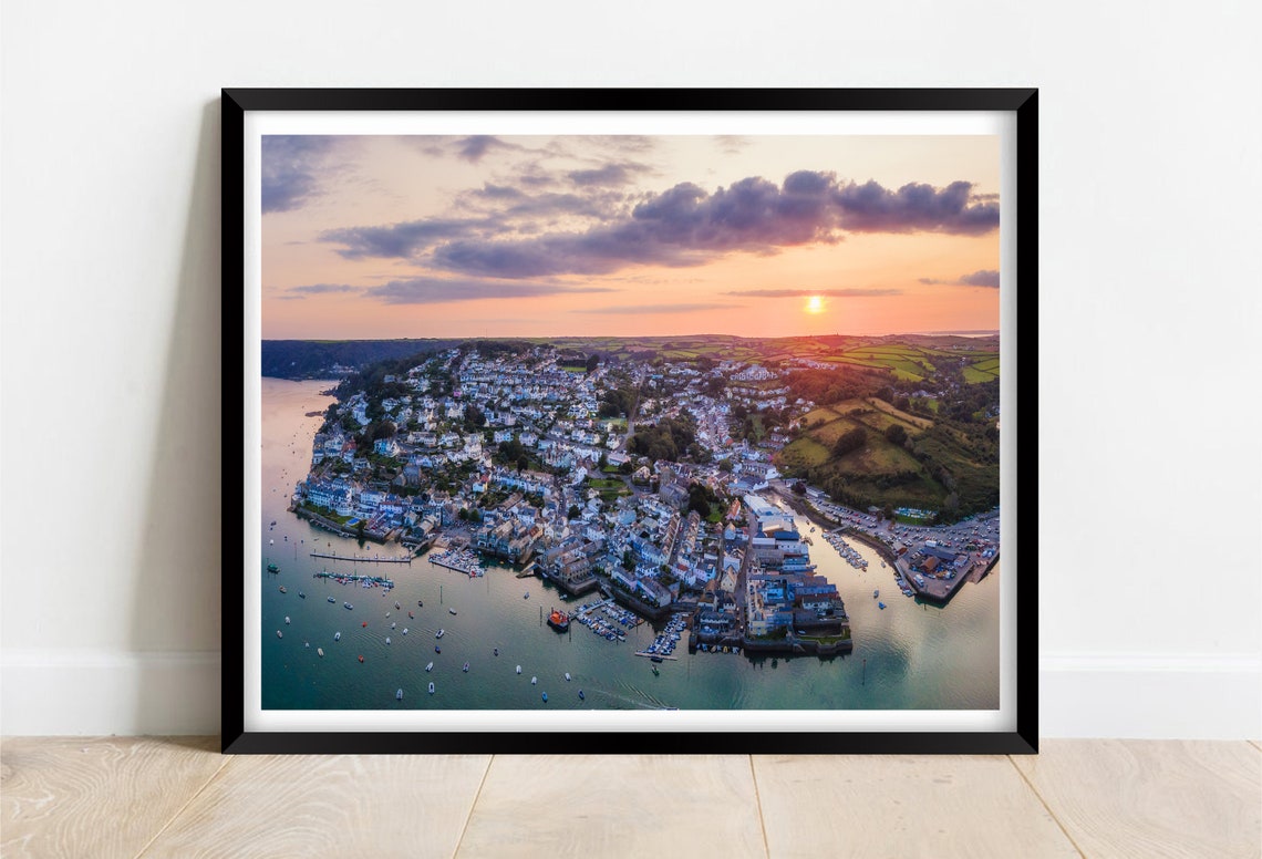 Aerial View of a Coastal Town at Sunset Over the Harbor Poster