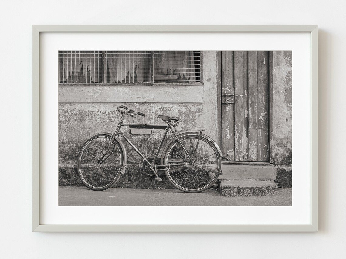 Old Bicycle Against Weathered Wall In Kochi Black And White Photo Poster