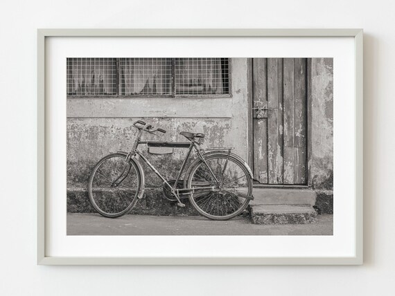Old Bicycle Against Weathered Wall In Kochi Black And White Photo Poster