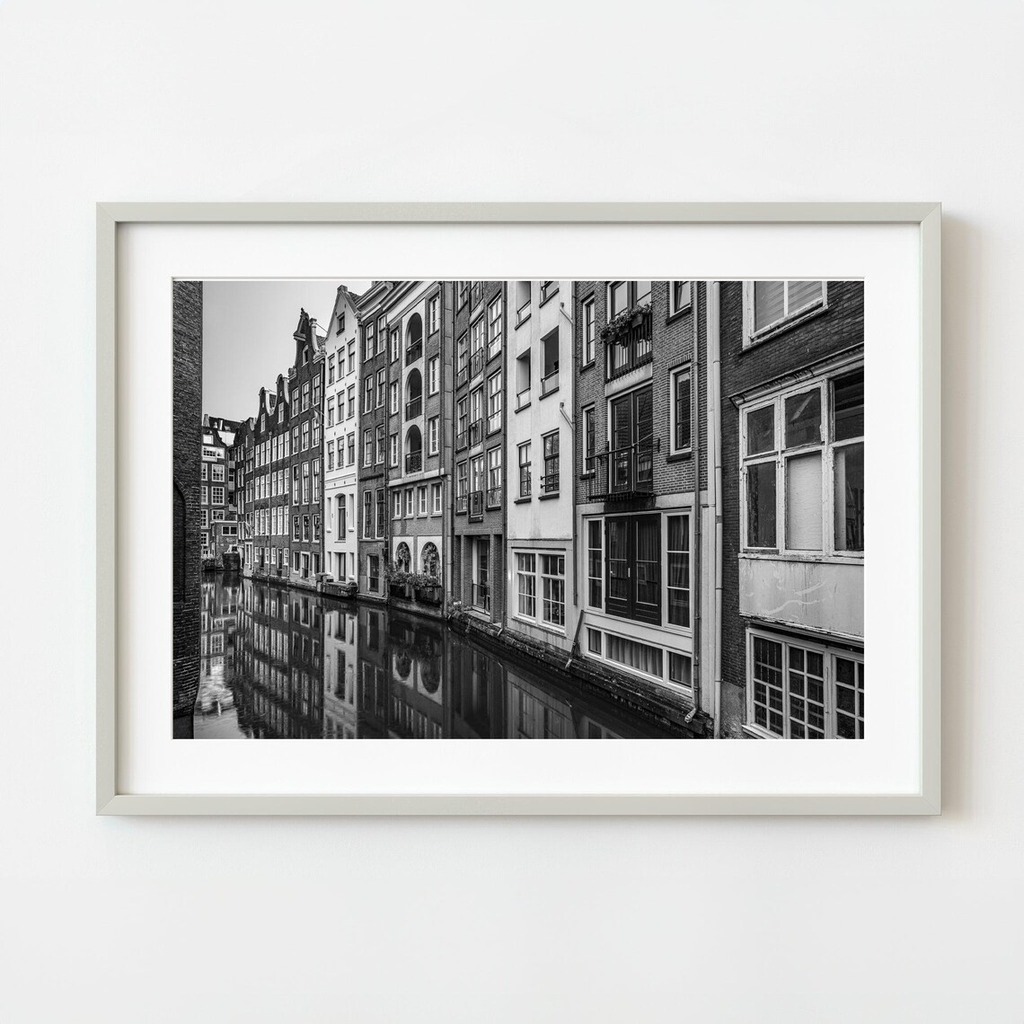 Black and White Photo of Canal Houses Reflecting in Water Poster