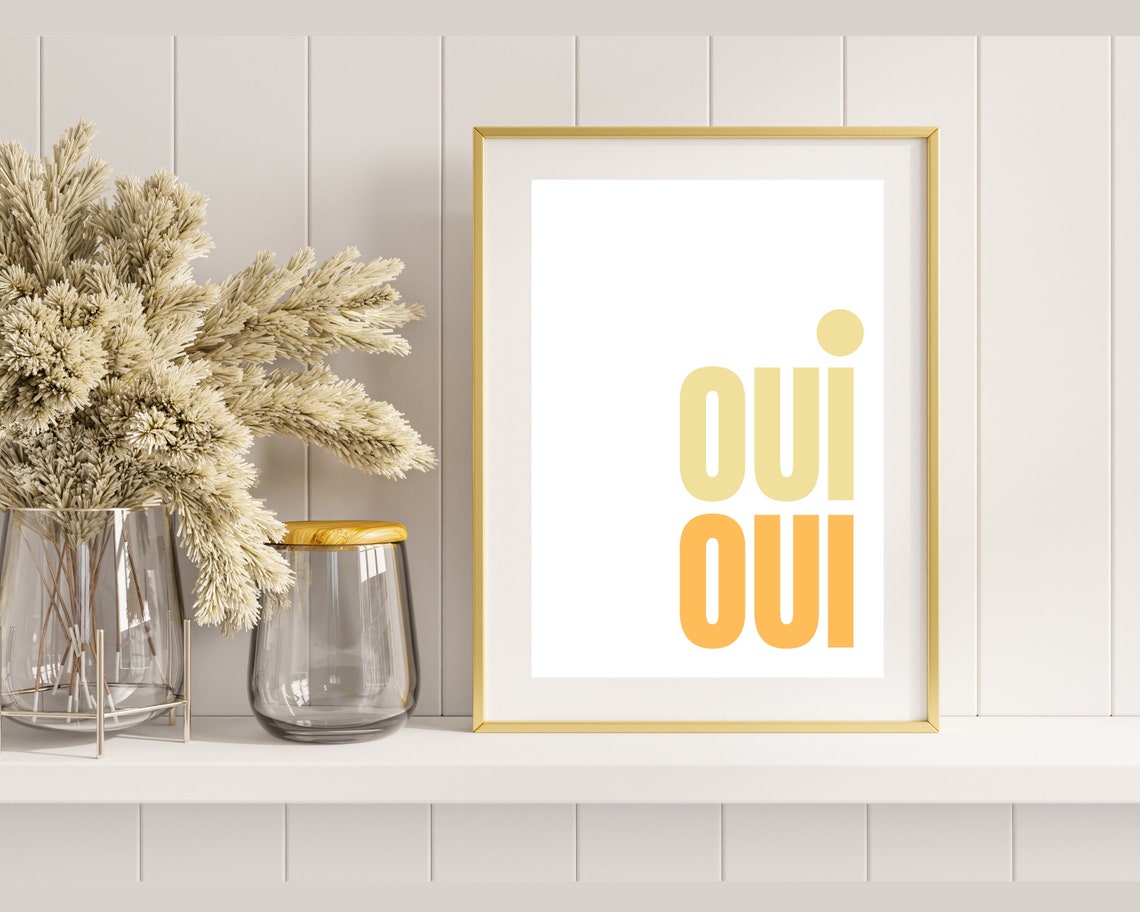 Oui Oui Typography Poster In Cream And Orange On A White Wall - Image 3