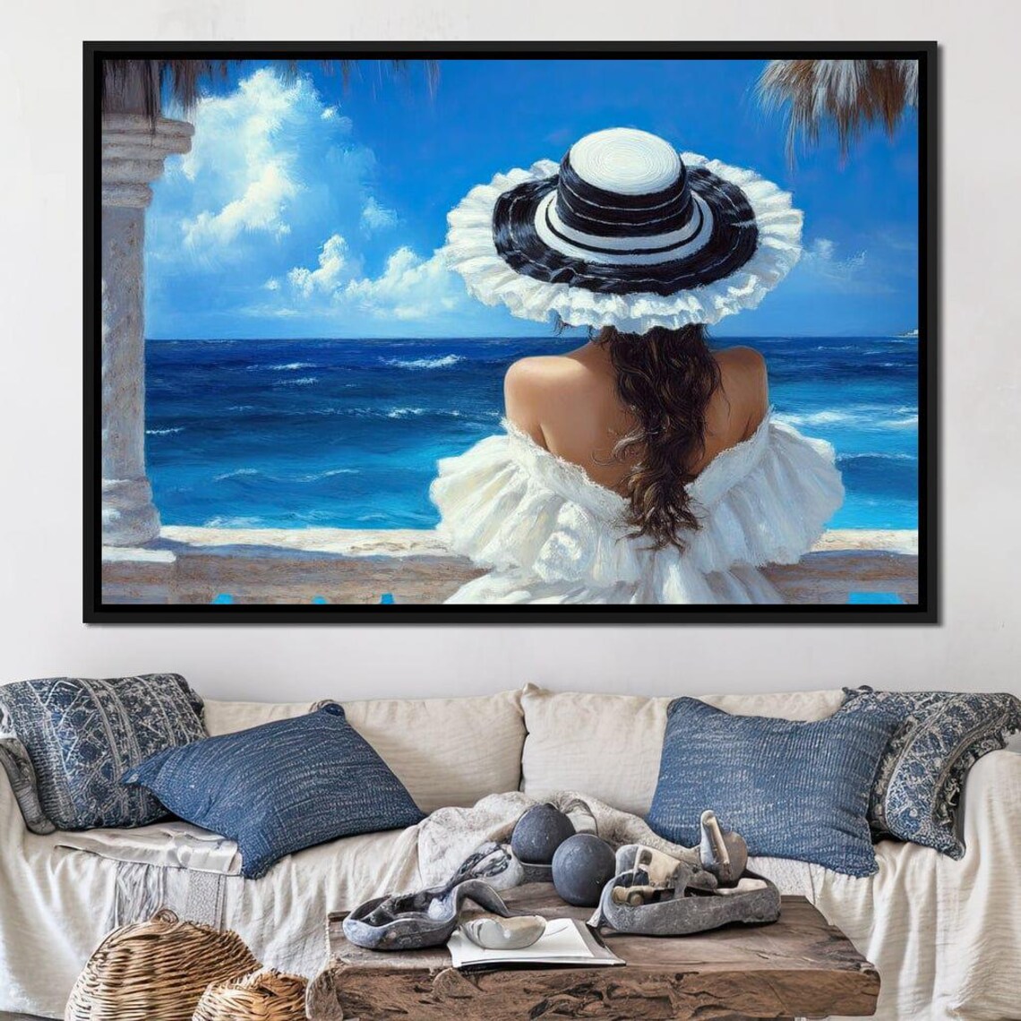 Woman In A Sun Hat Gazing At The Bright Ocean Coastline Poster