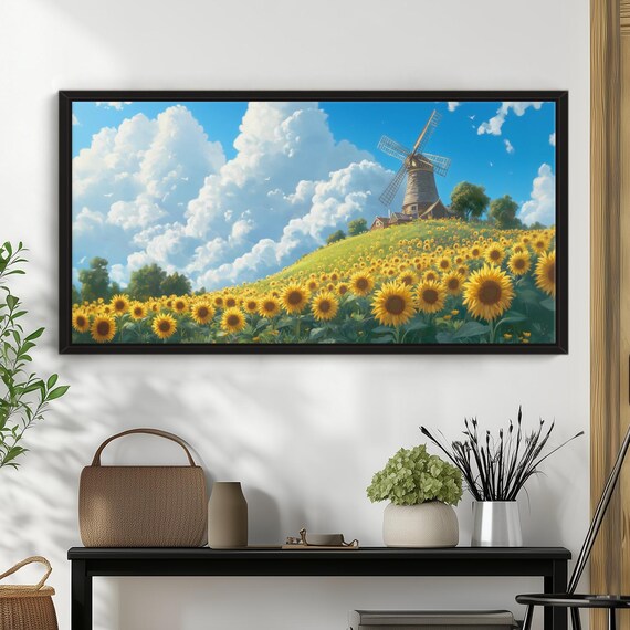 Windmill Over a Golden Sunflower Field Under Bright Blue Sky Art Print